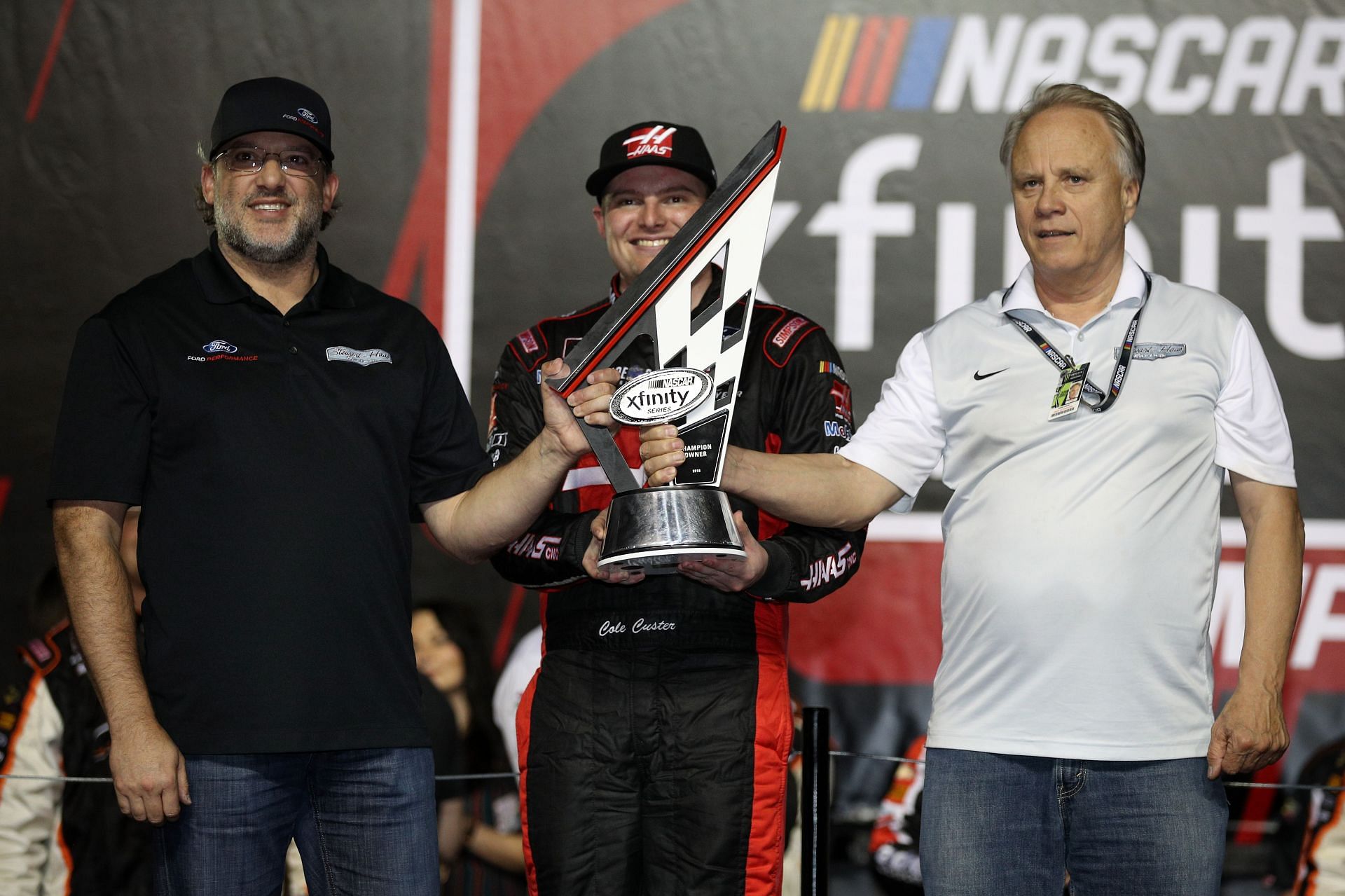 Who are the owners of Stewart-Haas Racing?
